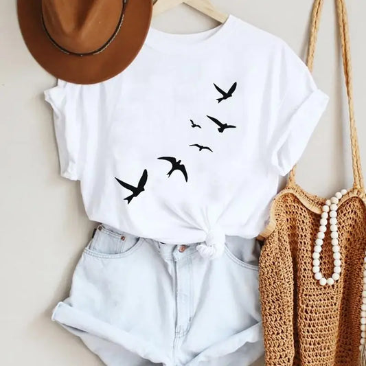 Get Trendy with our Women's Cartoon Bird Graphic Tee - Perfect for Summer Travels!